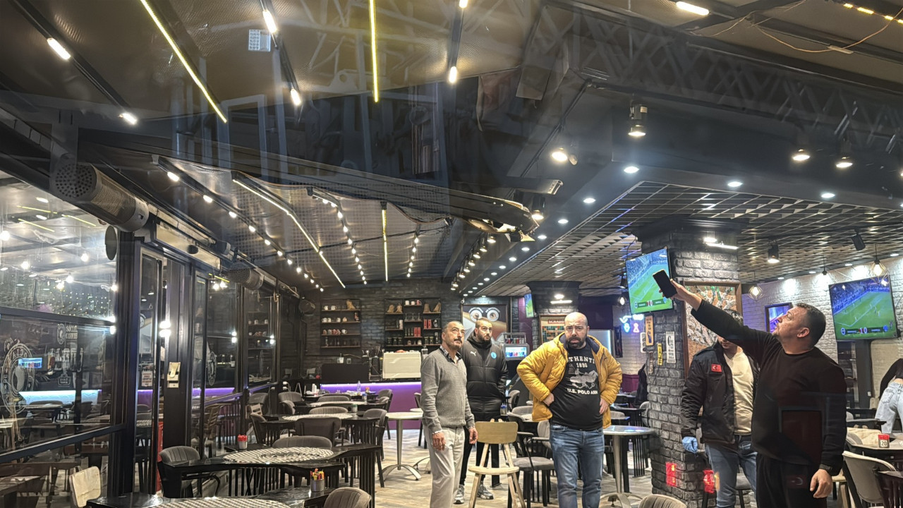 Yedinci kattan kafeye düştü