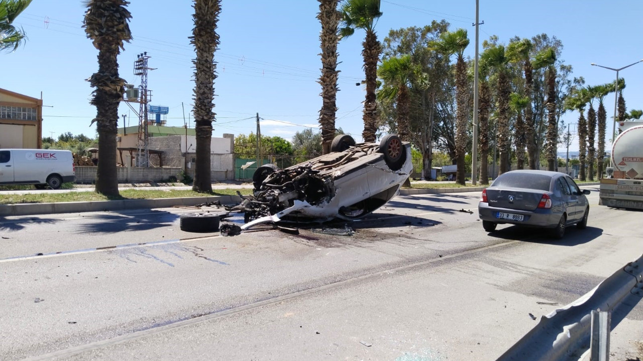 Ters dönen otomobilden yara bile almadan çıktı