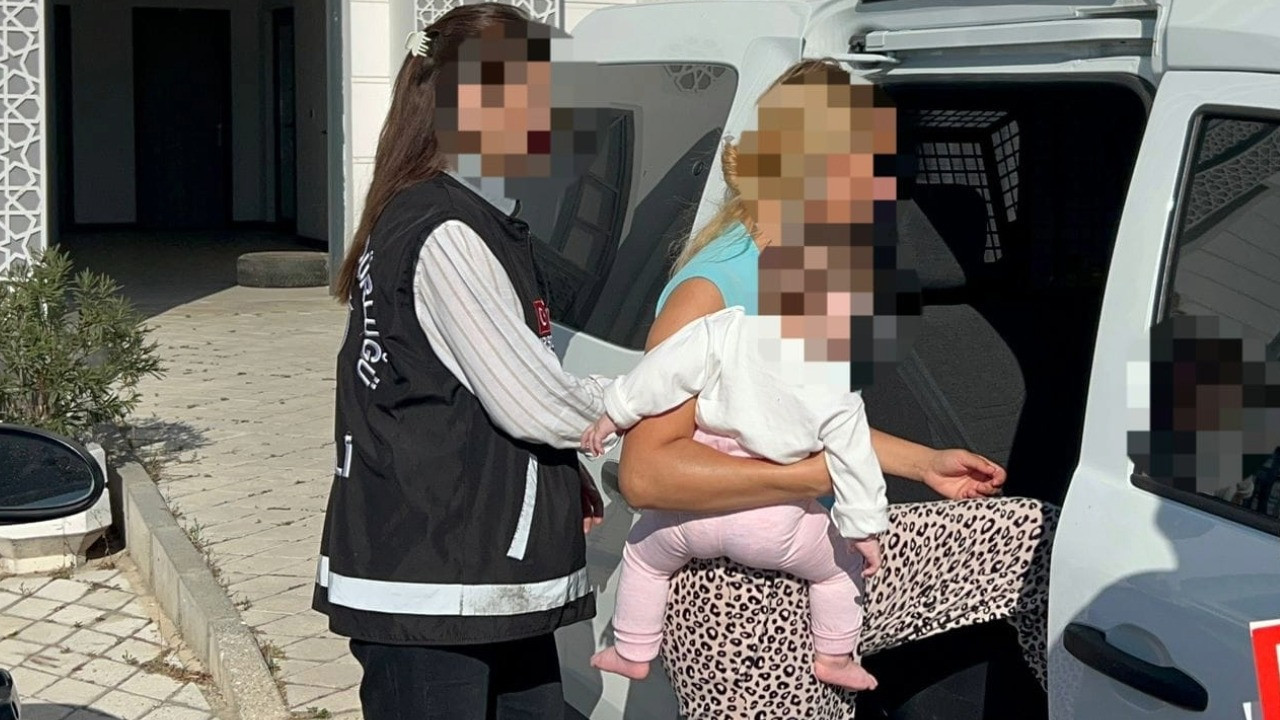 Suç makinesi kucağında bebeğiyle tutuklandı