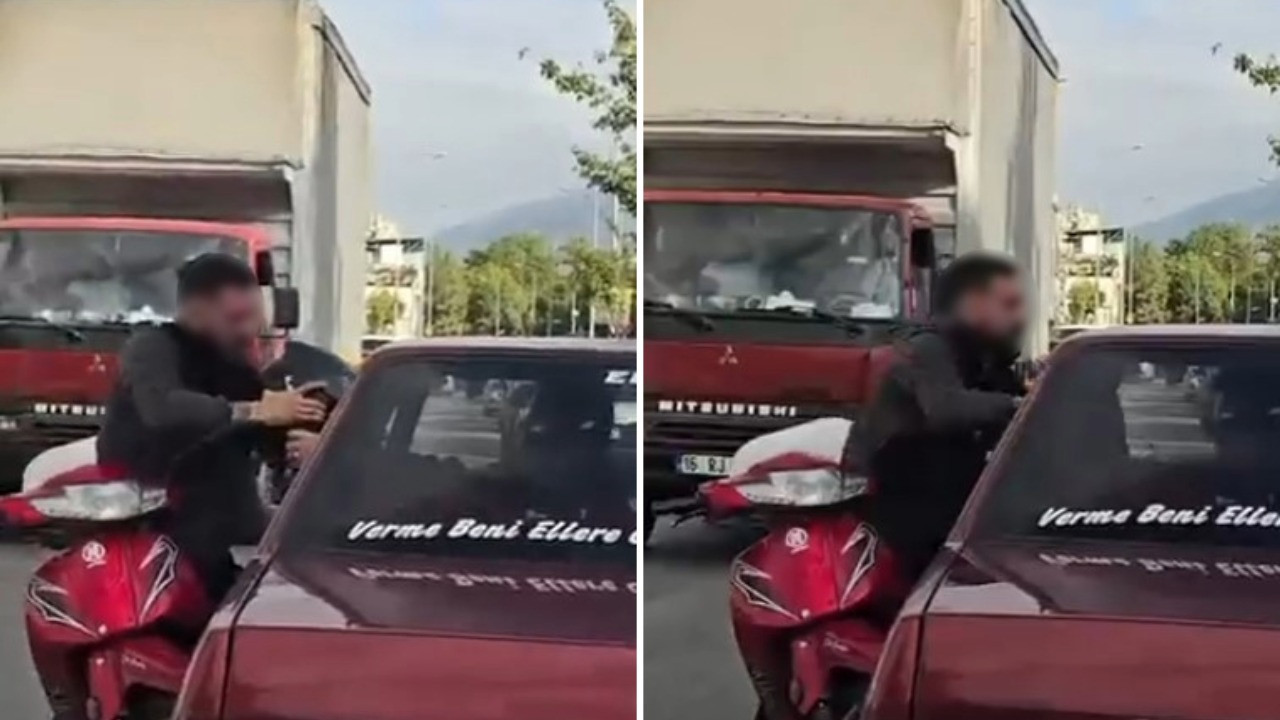 Otomobil sürücüsü inmeyi reddetti, motorcu camdan girmeye çalıştı