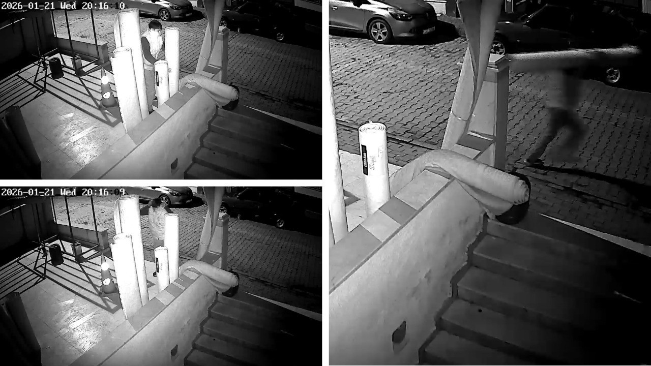 Yüzünü montuyla gizledi, halıyı alıp kayboldu