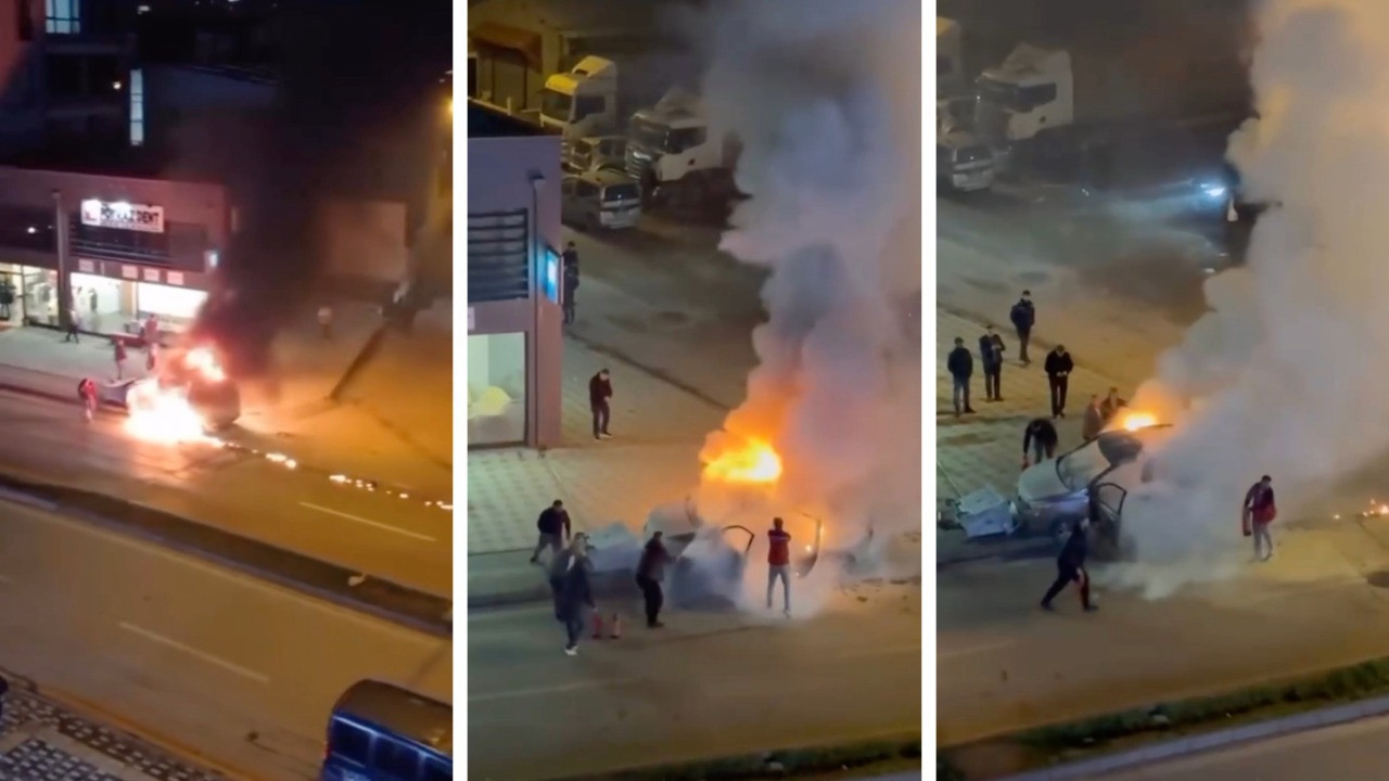 Araç alev aldı, esnaf yangın tüpleriyle koştu