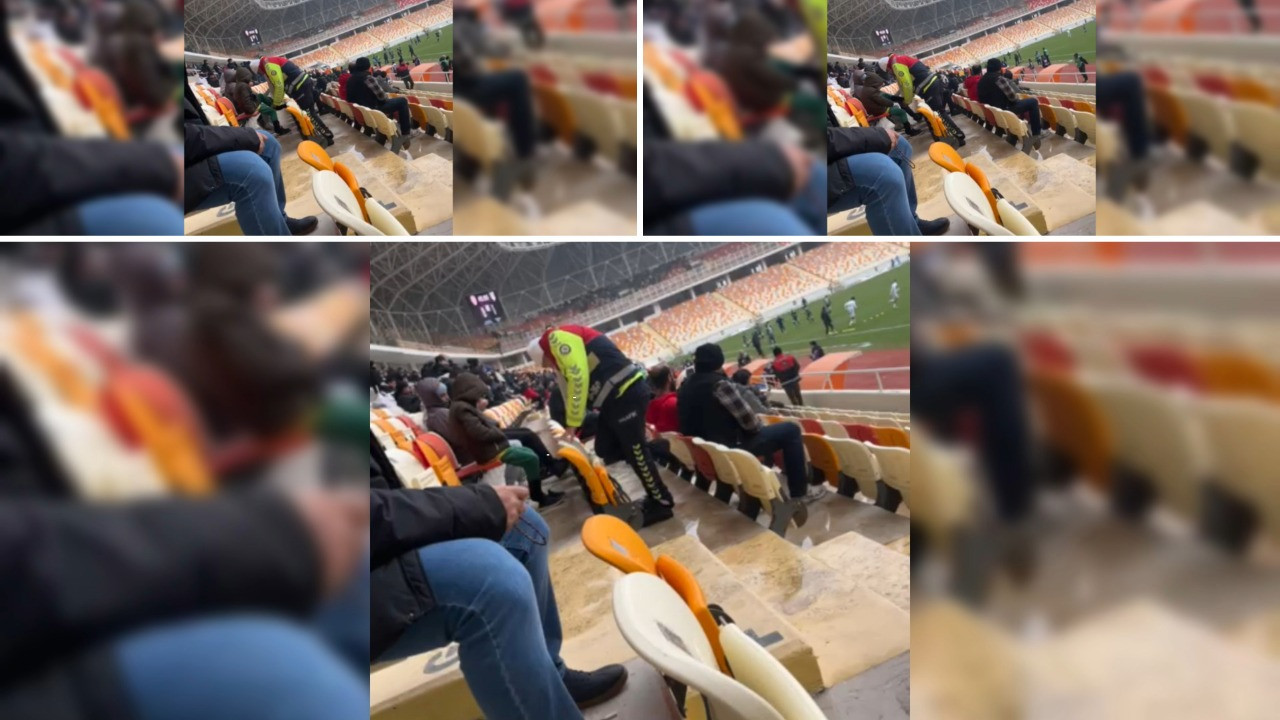 Statta yürek ısıtan görüntü: Polis, üşüyen çocuğa çorabını çıkarıp verdi