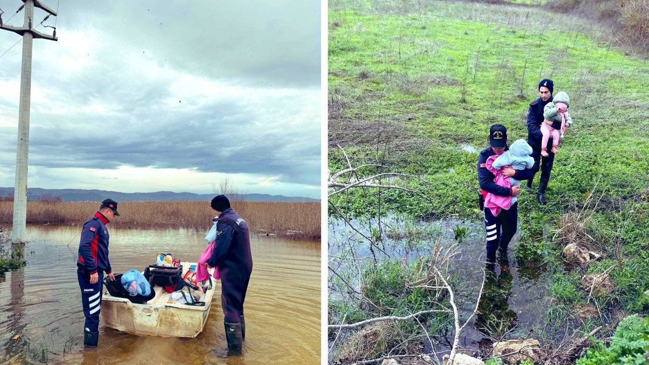 Göl taşınca mahsur kalan aile botla kurtarıldı