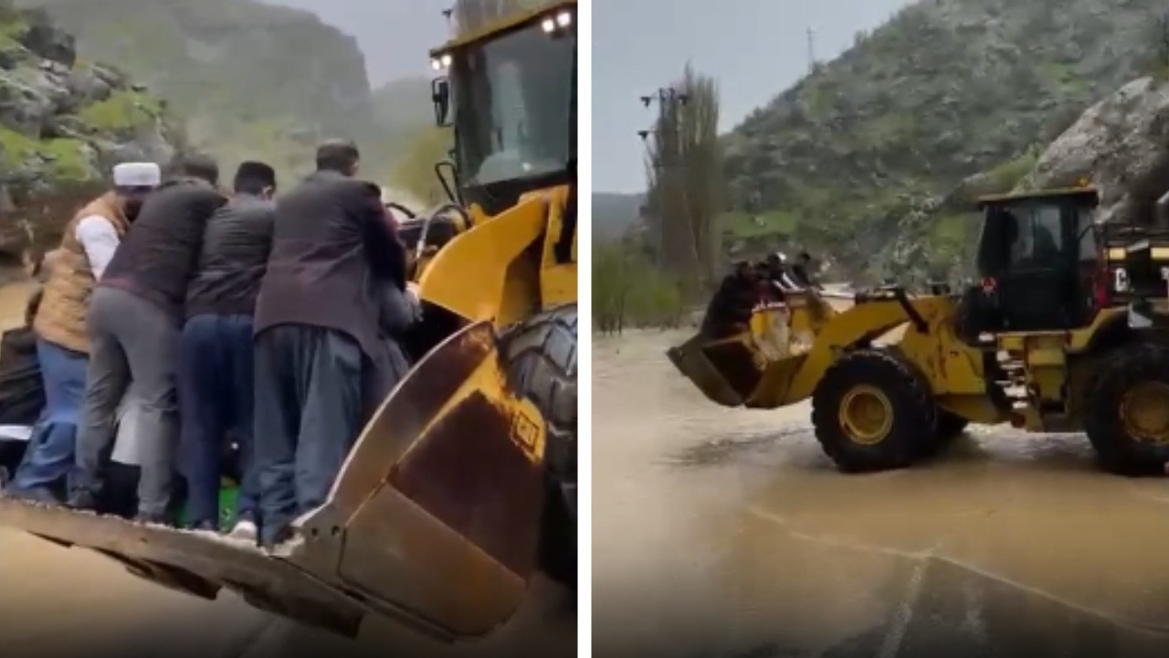 Cenazeyi kepçeyle taşıdılar