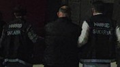 18 yıl 9 ay hapisle aranan kişi, peruk ve sahte pasaportla yakalandı