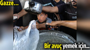 Gazze'de bir avuç yemek için uzanan poşet... İnsanlık utansın