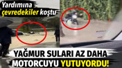 Yağmur suları motorcuyu yutuyordu!