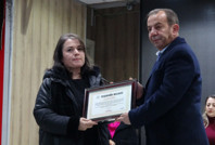 Tanju Özcan'dan tutuklanan belediye personeli ile itfaiyecilere hizmet şeref belgesi