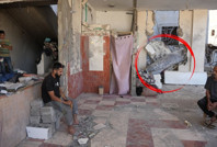 Evlerine düşen 'patlamaya hazır' bombayla yaşıyorlar