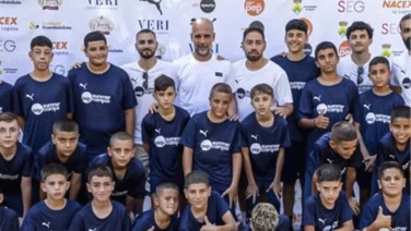 Pep Guardiola yaz kampında Filistinli çocukları ağırladı