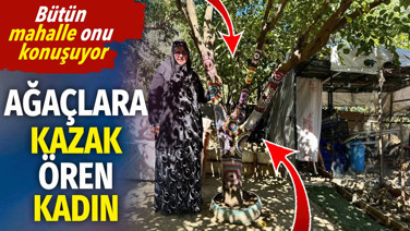 Ağaçlara kazak ören kadın. Bütün mahalle onu konuşuyor