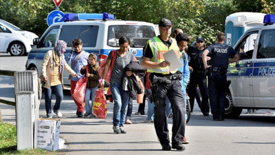 Almanya'da Suriyelilerin koruma statüleri iptal edilecek