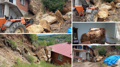 Heyelanda kopan kaya parçaları ev ve traktörün üstüne düştü
