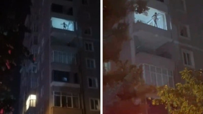 8'inci katta tehlikeli anlar: Balkon duvarına çıkıp dans etti