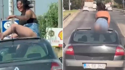 Aracın tavanında twerk yapan kadın ve sürücü gözaltına alındı