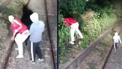 Durduramadıkları treni taşladılar! Raylarda tehlikeli anlar