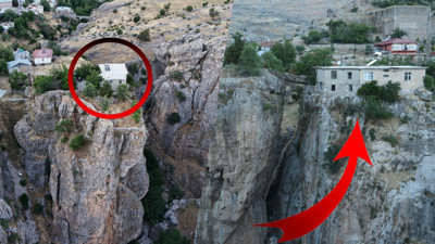 Dünyayla bağlantısını kesmiş gibi. Uçurumun kenarındaki kayalığa yerleşti