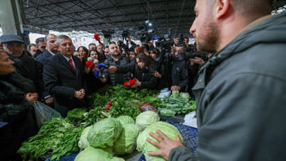 Özgür Özel pazara indi