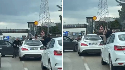 Yumruklar havada uçuştu: Araçların üstünden atlayıp kavga ettiler