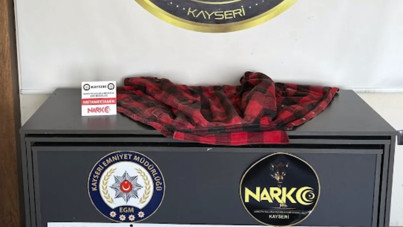 Kıyafete emdirilmiş 1.4 kilo metamfetamin ele geçirildi