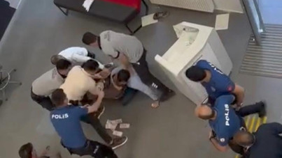 Banka müdürüne bıçak çekip soyguna kalkıştı