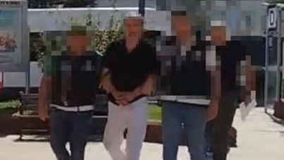 43 yıl hapisle aranıyordu, çatıdan kaçarken yakalandı