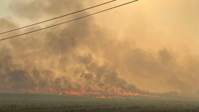 Manisa’da başlayıp İzmir’e ulaşan yangın kontrol altında