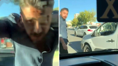 Trafikte tartıştığı sürücünün otomobilinin camını kırdı