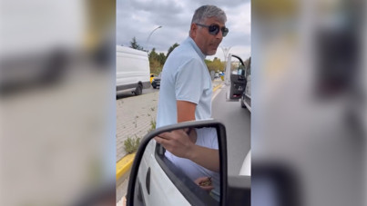 Önünü kestiği hafif ticari aracın sürücüsünü tehdit etti