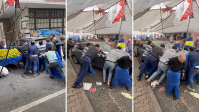 Pazar yerinde unutulan aracı pazarcılar elbirliğiyle taşıdı