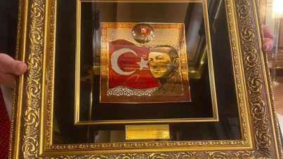 Resepsiyona gitmeyen Bahçeli'den Erdoğan'a hediye