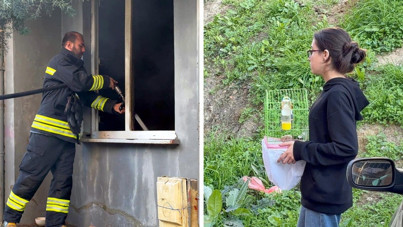 Yangında dumanın kapladığı apartmandaki evlerinden kafesteki kuşu ile çıktı