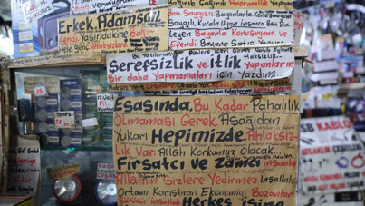 Anlatmaktan sıkıldı, dükkanı notlarla doldurdu: Allah size yedirmez inşallah