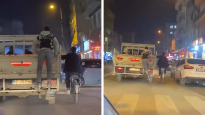 Patenli ve bisikletli iki gençten trafikte tehlikeli hareketler