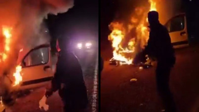 Yanan araçtaki aileyi böyle kurtardı