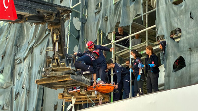 5. kattan düşen işçi, iş makinesiyle kurtarıldı