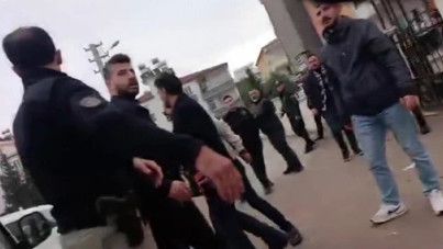 Polisten gazetecilere meydan dayağı