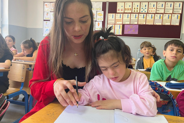 Bahçede köpeğiyle oynuyordu: Bir öğretmen hayatını değiştirdi