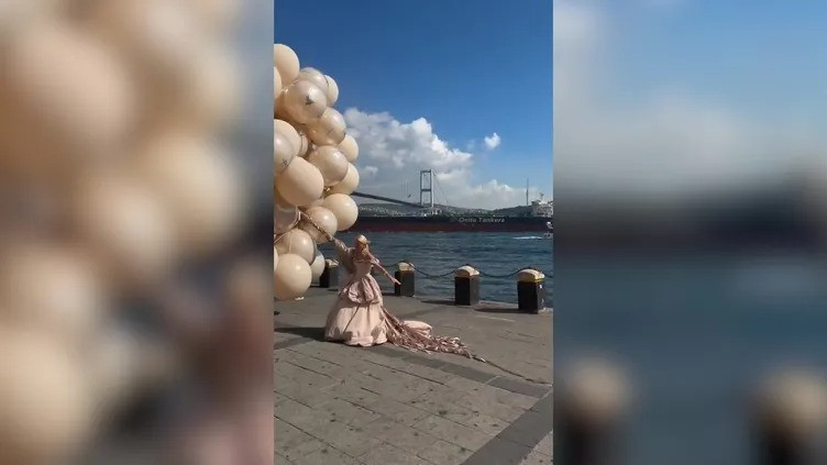 Uçan balonlar kadını götürüyordu. Fotoğrafçı havada kaptı - Resim : 2