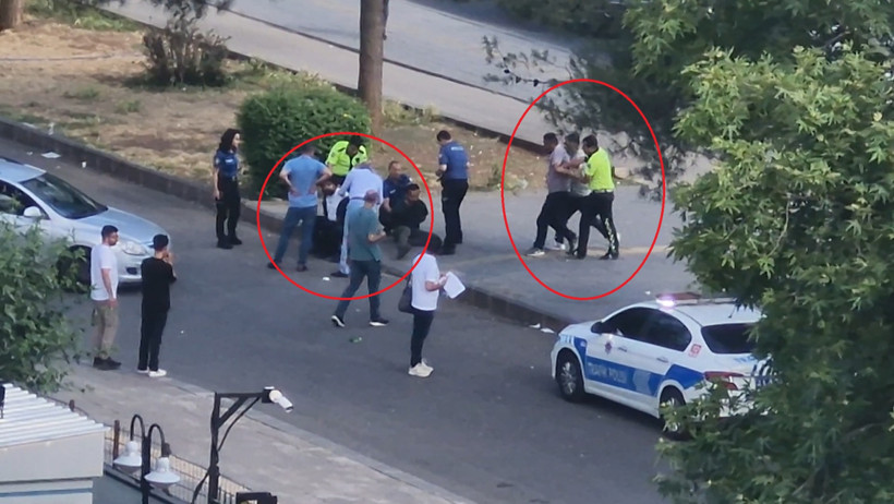 Adliyeyi görüntüleyen kişiler, kendilerini uyaran polise saldırdı: 4 gözaltı - Resim : 1